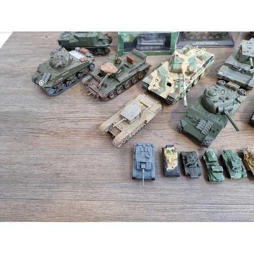 400 - A collection of various model tanks to include boxed Atlas Editions Ultimate Tank Collection, Soledo... 