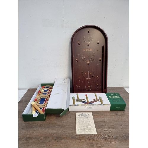 403 - Two vintage style toys, one Past Times Bagatelle board and one boxed Jaques Royal Quoits set