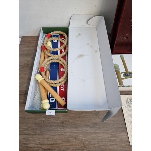 403 - Two vintage style toys, one Past Times Bagatelle board and one boxed Jaques Royal Quoits set