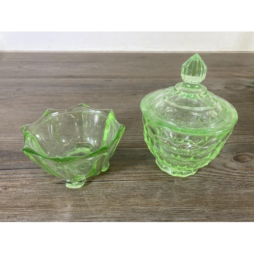 288 - A collection of vintage uranium glassware to include candlesticks, ring holder etc.