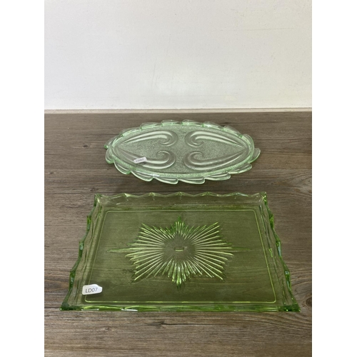 288 - A collection of vintage uranium glassware to include candlesticks, ring holder etc.