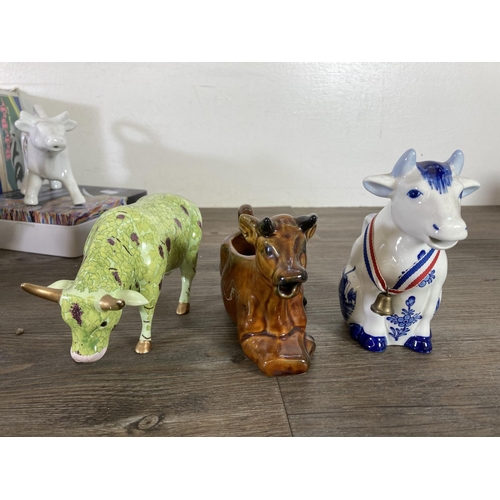 291 - A collection of cow themed ceramics to include Border Fine Arts The Young Herriot Studio Collection ... 