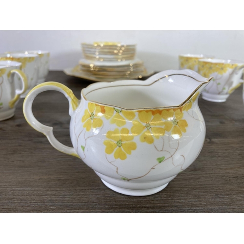 295 - A Grafton China hand painted twenty one piece tea set - ref. 6126