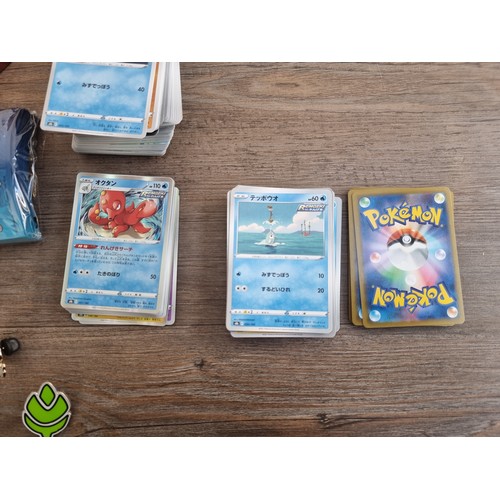 404 - A large collection of English and Japanese Pokemon cards