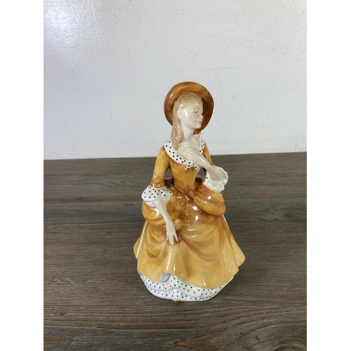 299 - Five ceramic figurines to include Royal Doulton Sandra - HN 2275, Paragon Lady Cynthia, Royal Doulto... 