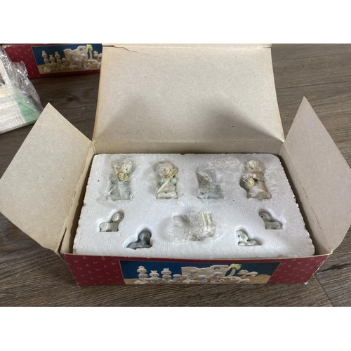 300 - A collection of Enesco figurines and ornaments