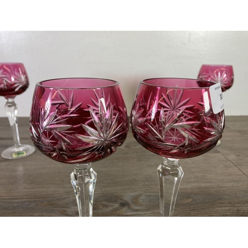 308 - Six Lausitzer Glas cranberry glass mouth blown hand cut hock glasses - approx. 19.5cm high