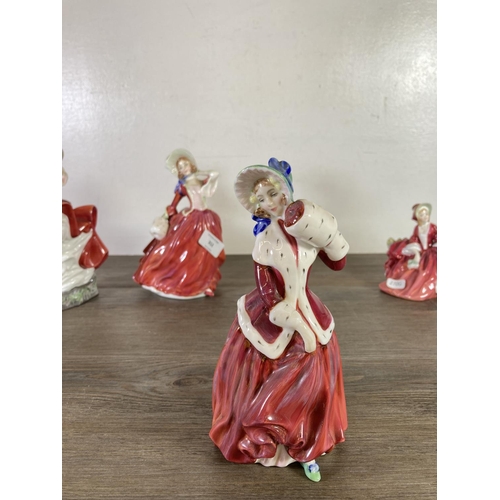 312 - Four Royal Doulton figurines, Christmas Morn - HN 1992, Lydia - HN 1908, Autumn Breezes - HN 1934 an... 