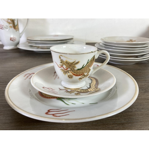 316 - An Oriental lithophane twenty seven piece tea set