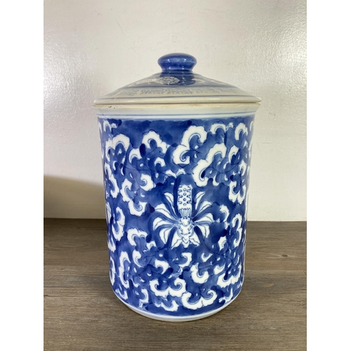 321 - Two pieces of blue and white transferware china, one 37cm bowl and one 34cm lidded storage barrel