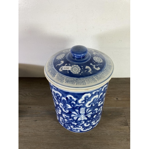 321 - Two pieces of blue and white transferware china, one 37cm bowl and one 34cm lidded storage barrel