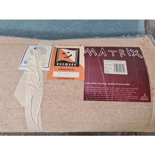 36 - An Asiatic Matrix MS34 100% wool pile rug - approx. 140cm x 200cm