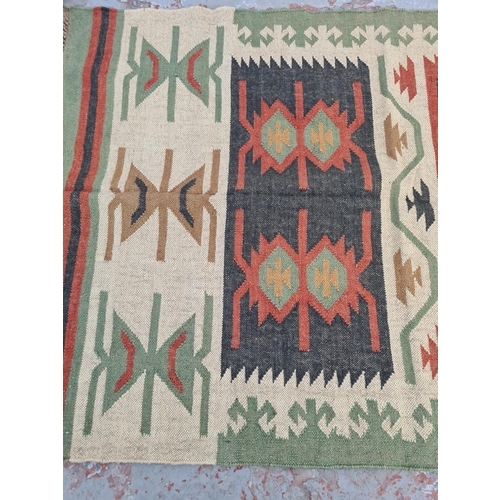 103 - A mid 20th century Kilim rug - approx. 188cm x 120cm