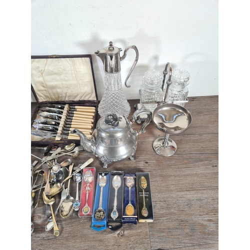 357 - A collection of metalware to include Shaw & Fisher Sheffield coffee pot, silver plated and cut glass... 