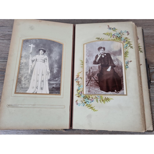 476 - A Victorian carte de visite album containing approx. thirty five cards