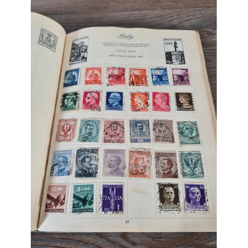 481 - A Royal Mail stamp album containing antique and vintage worldwide stamps