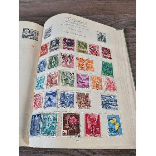 481 - A Royal Mail stamp album containing antique and vintage worldwide stamps