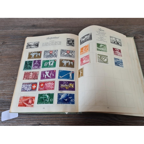 481 - A Royal Mail stamp album containing antique and vintage worldwide stamps