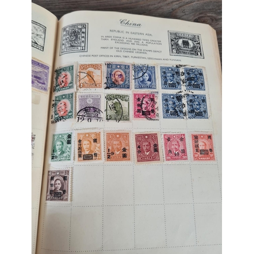 481 - A Royal Mail stamp album containing antique and vintage worldwide stamps