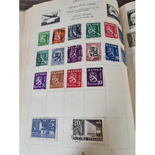 481 - A Royal Mail stamp album containing antique and vintage worldwide stamps