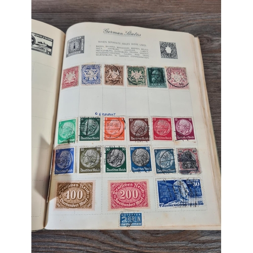 481 - A Royal Mail stamp album containing antique and vintage worldwide stamps