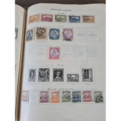 482 - A Stanley Gibbons Ltd The Ideal Postage Stamp Album containing antique and vintage worldwide stamps