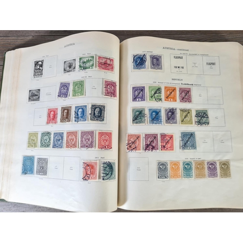 482 - A Stanley Gibbons Ltd The Ideal Postage Stamp Album containing antique and vintage worldwide stamps