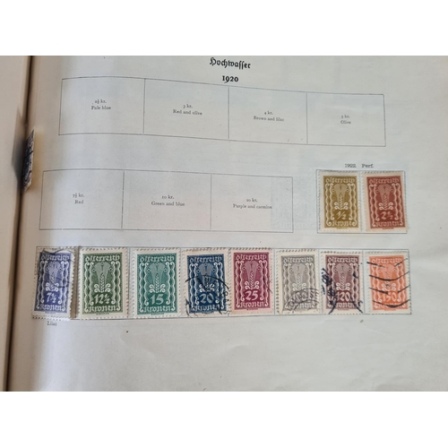 482 - A Stanley Gibbons Ltd The Ideal Postage Stamp Album containing antique and vintage worldwide stamps