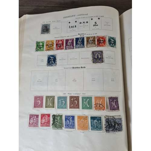 482 - A Stanley Gibbons Ltd The Ideal Postage Stamp Album containing antique and vintage worldwide stamps