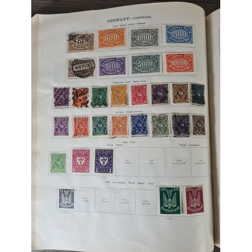 482 - A Stanley Gibbons Ltd The Ideal Postage Stamp Album containing antique and vintage worldwide stamps