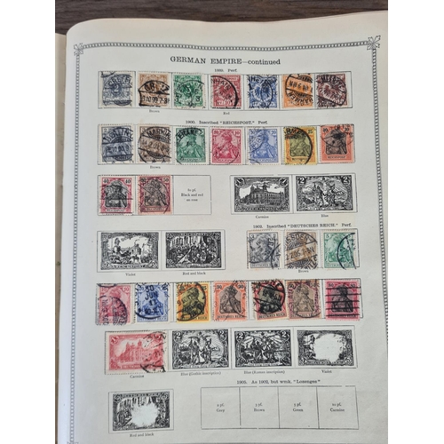 483 - A Stanley Gibbons Ltd The Ideal Postage Stamp Album containing antique and vintage worldwide stamps