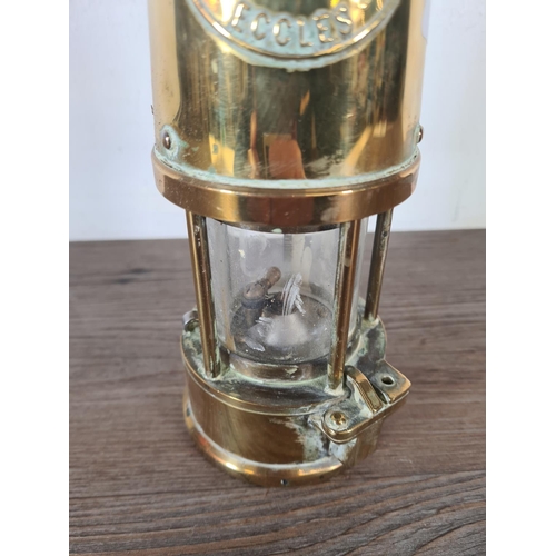 491 - A vintage The Protector Lamp & Lighting Co. Ltd Eccles type 6 brass miner's lamp - approx. 25cm high