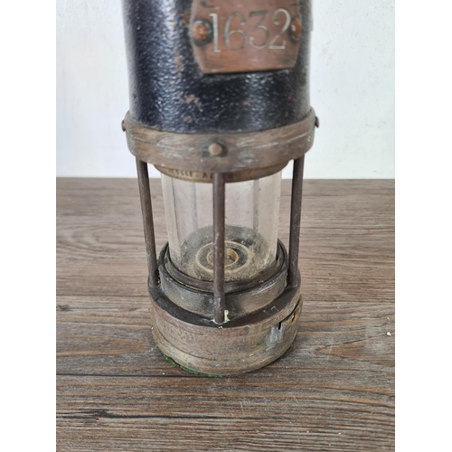 494 - An early 20th century brass and steel miner's lamp stamped NHC Patent 4562 - approx. 25cm high