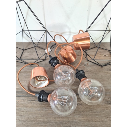 500 - Three lighting items, one Ikea copper effect three bulb pendant light and two black metal geometric ... 