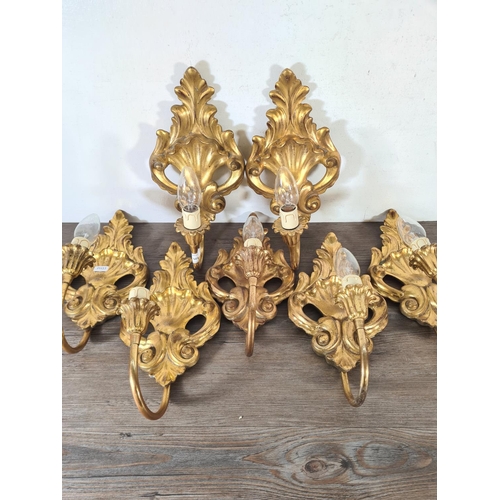 501 - Seven Rococo style gilded wall sconces