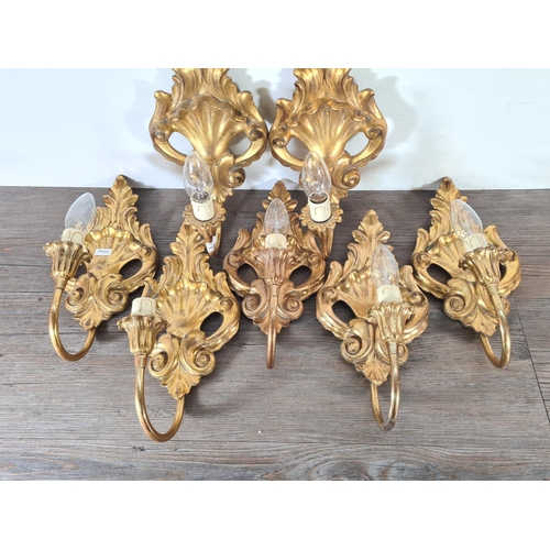 501 - Seven Rococo style gilded wall sconces