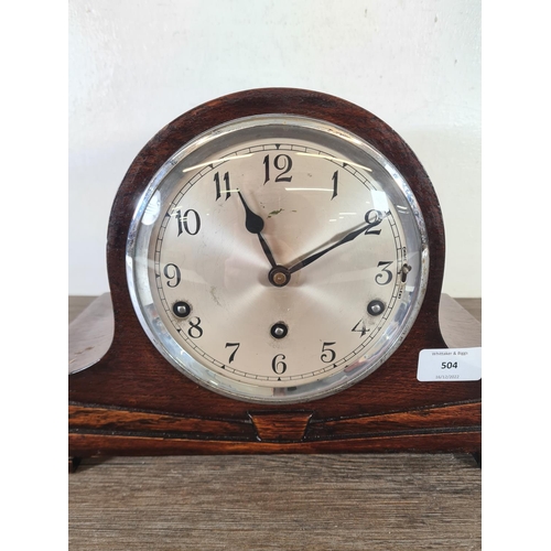 504 - A Garrard oak cased chiming mantel clock with pendulum - approx. 21.5cm high x 33cm wide x 15cm deep