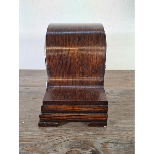 504 - A Garrard oak cased chiming mantel clock with pendulum - approx. 21.5cm high x 33cm wide x 15cm deep