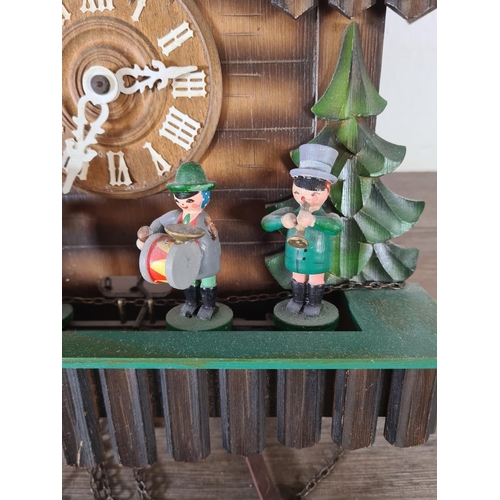 506 - A mid 20th century German Die Mühle Im Schwarzwald wooden cuckoo clock with pendulum and weights - a... 