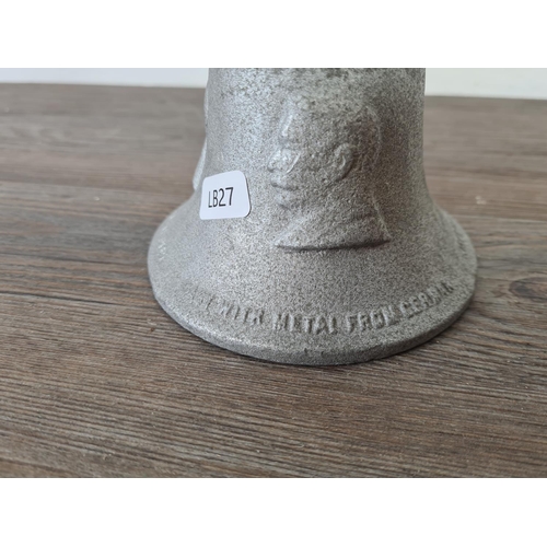 514 - A 1939-45 R.A.F. Benevolent Fund cast metal bell made from a German shot down over Britain - approx.... 