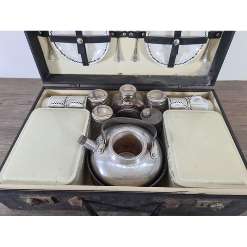 527 - A mid 20th century cased Brexton picnic set