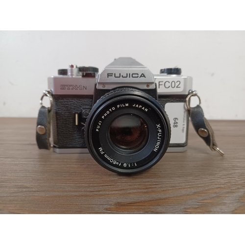 648 - An early 1980s Fujica STX-1N 35mm SLR camera fitted with X-Fujinon 1:1.9 f=50mm FM lens