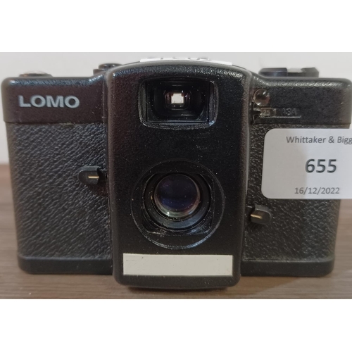 655 - A LOMO LC-A compact 35mm viewfinder camera fitted with Minitar-1 three element 32mm 1:2.8 lens