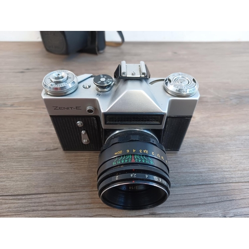 664 - Two 35mm SLR cameras, one cased KMZ Zenit-E and one Petri CT-1A fitted with Petri 35-70mm 1:3.5-4.5 ... 