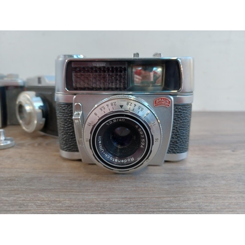 669 - Five 35mm cameras to include cased mid 1950s Zeiss Ikon Contina Ib fitted with Novicar-Anastigmat 1:... 