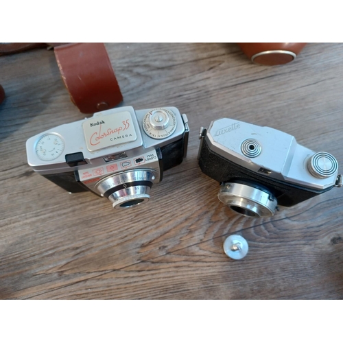 669 - Five 35mm cameras to include cased mid 1950s Zeiss Ikon Contina Ib fitted with Novicar-Anastigmat 1:... 