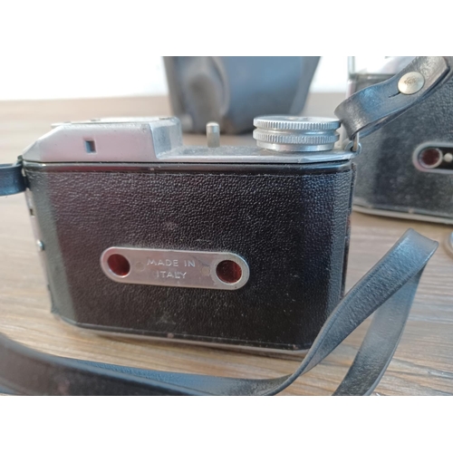 670 - Three Italian C.M.F. Bencini Comet viewfinder cameras for 127 film, one cased late 1940s and two ear... 