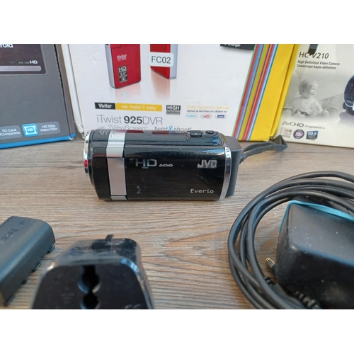 676 - Four HD digital camcorders, one boxed Polaroid DVG-720E, one JVC Everio, one Panasonic HC-V210 10mp ... 