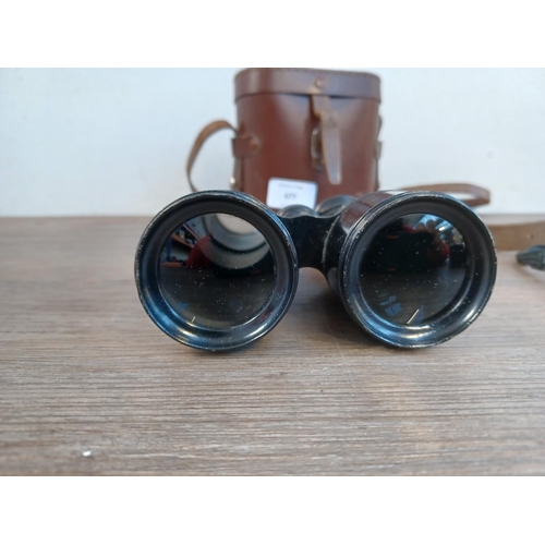 677 - Two cased pairs of binoculars, one WWI era French marked with altered/disguised military broad arrow... 