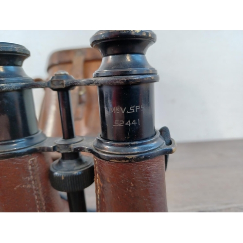 677 - Two cased pairs of binoculars, one WWI era French marked with altered/disguised military broad arrow... 